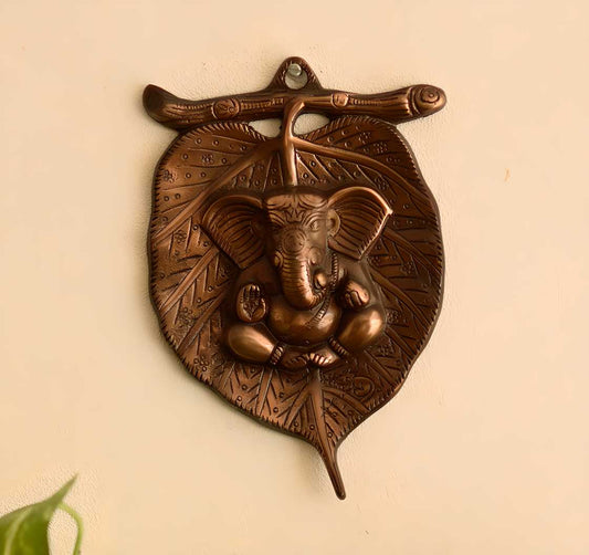 Metal wall hanging of Lord Ganesha on Leaf